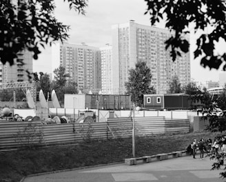 a black and white photo of a city with tall buildings