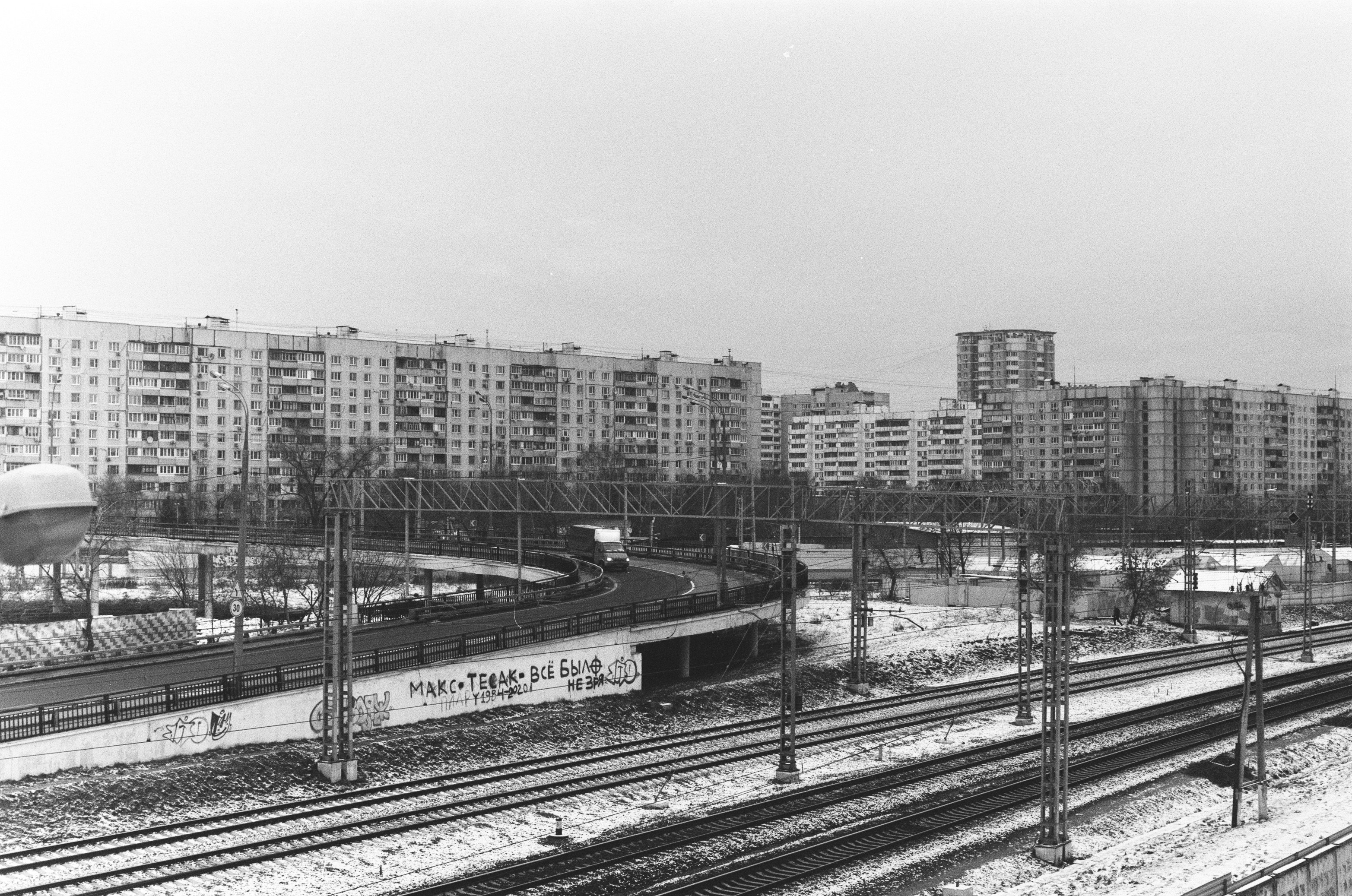 a black and white photo of a train track