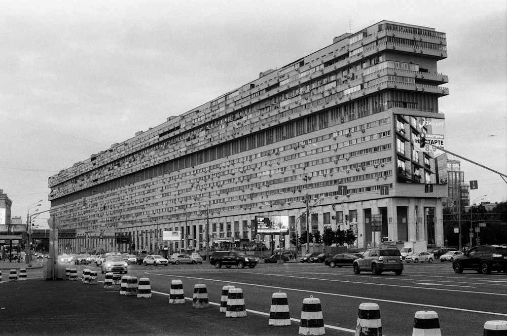 a black and white photo of a very tall building