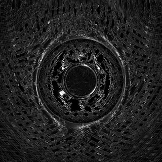 a black and white photo of a circular object