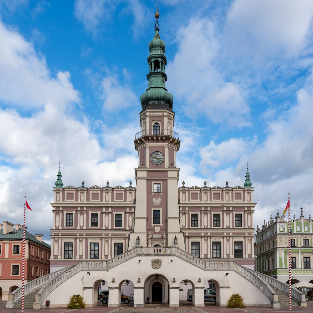 a large building with a clock on the top of it