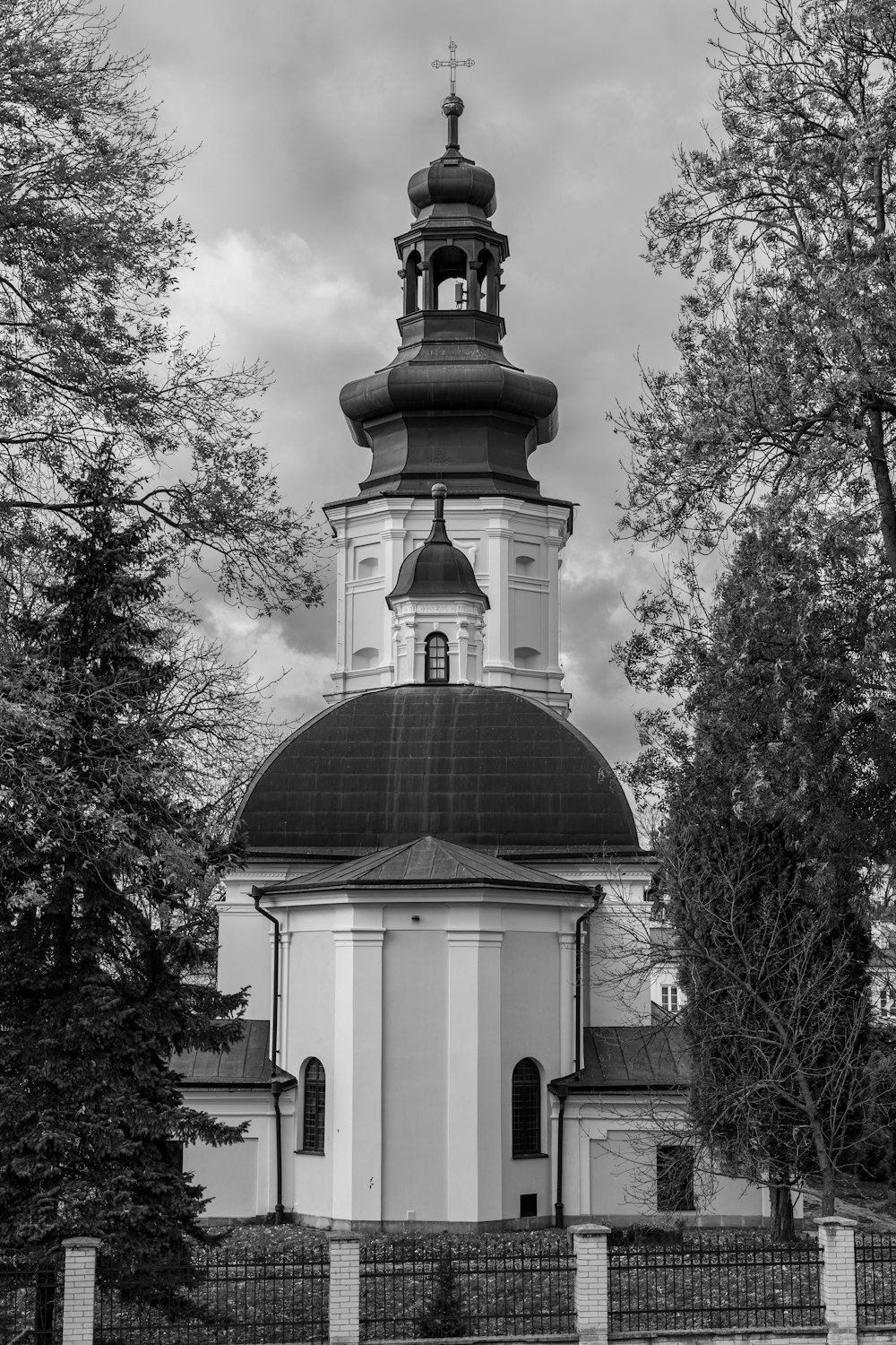 a black and white photo of a church