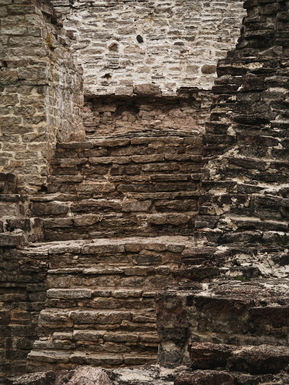 a stone building with steps leading up to it