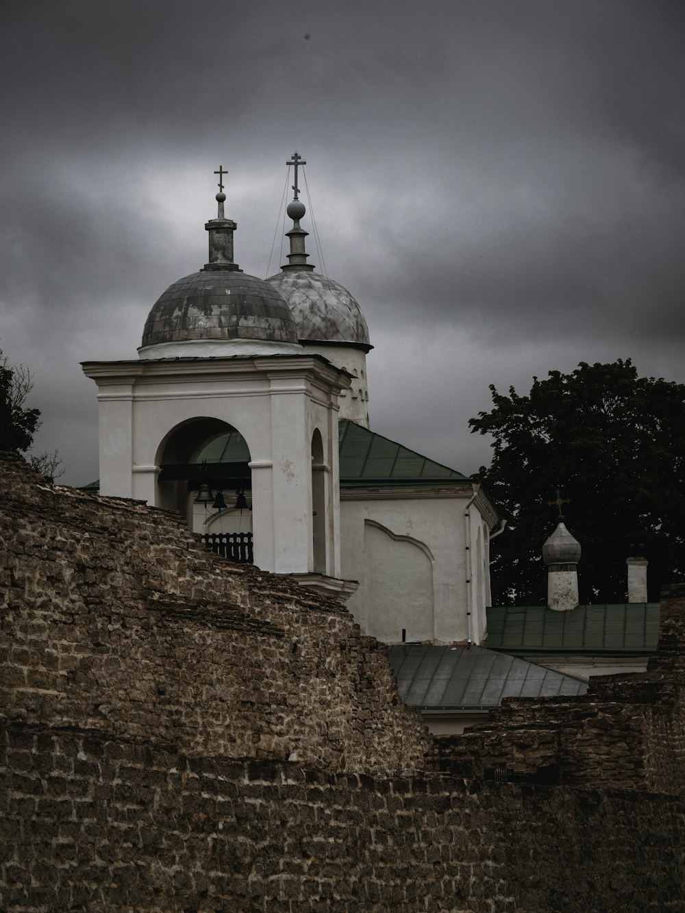 a white building with a cross on top of it