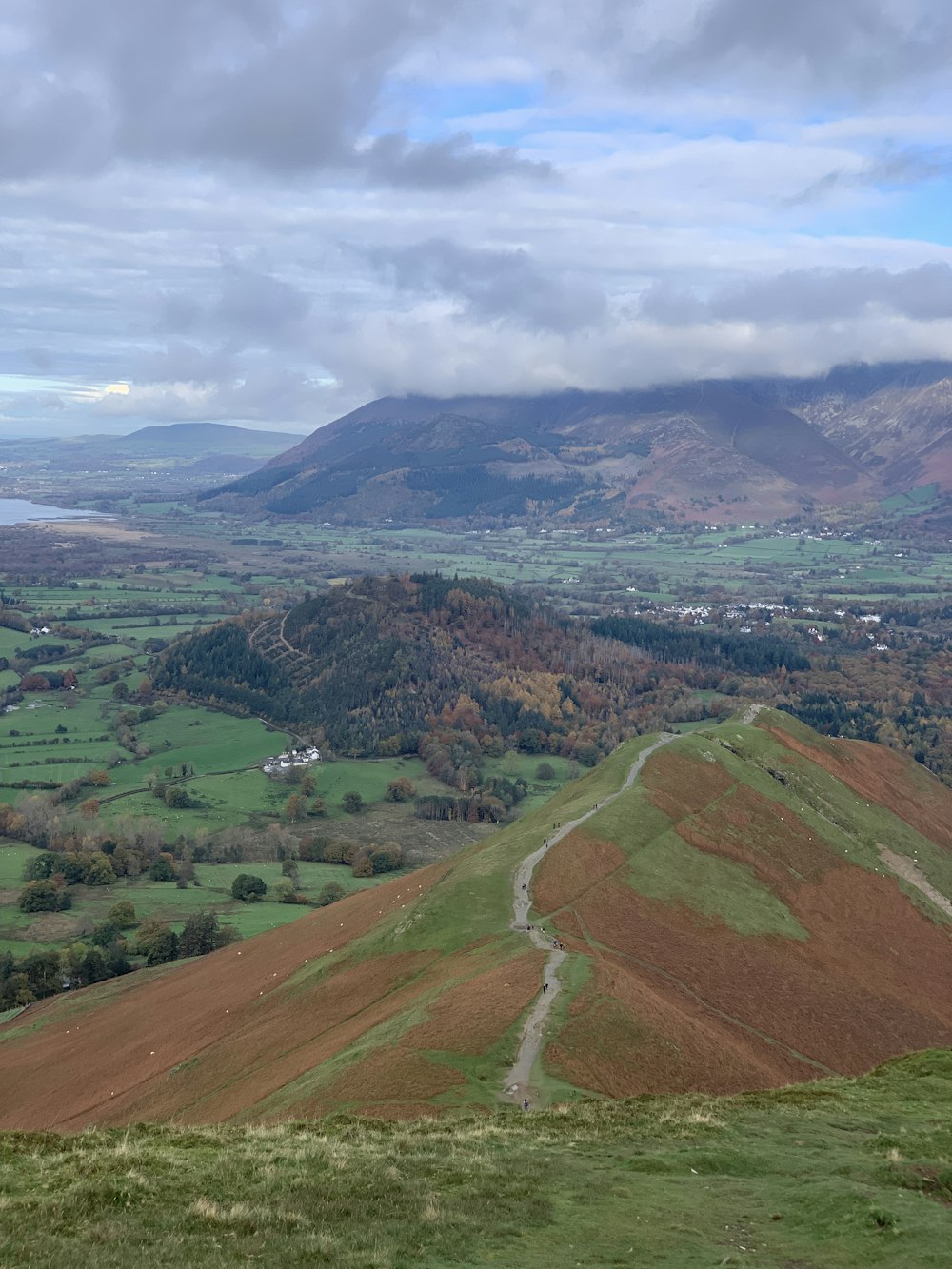 a view of the countryside from a hill