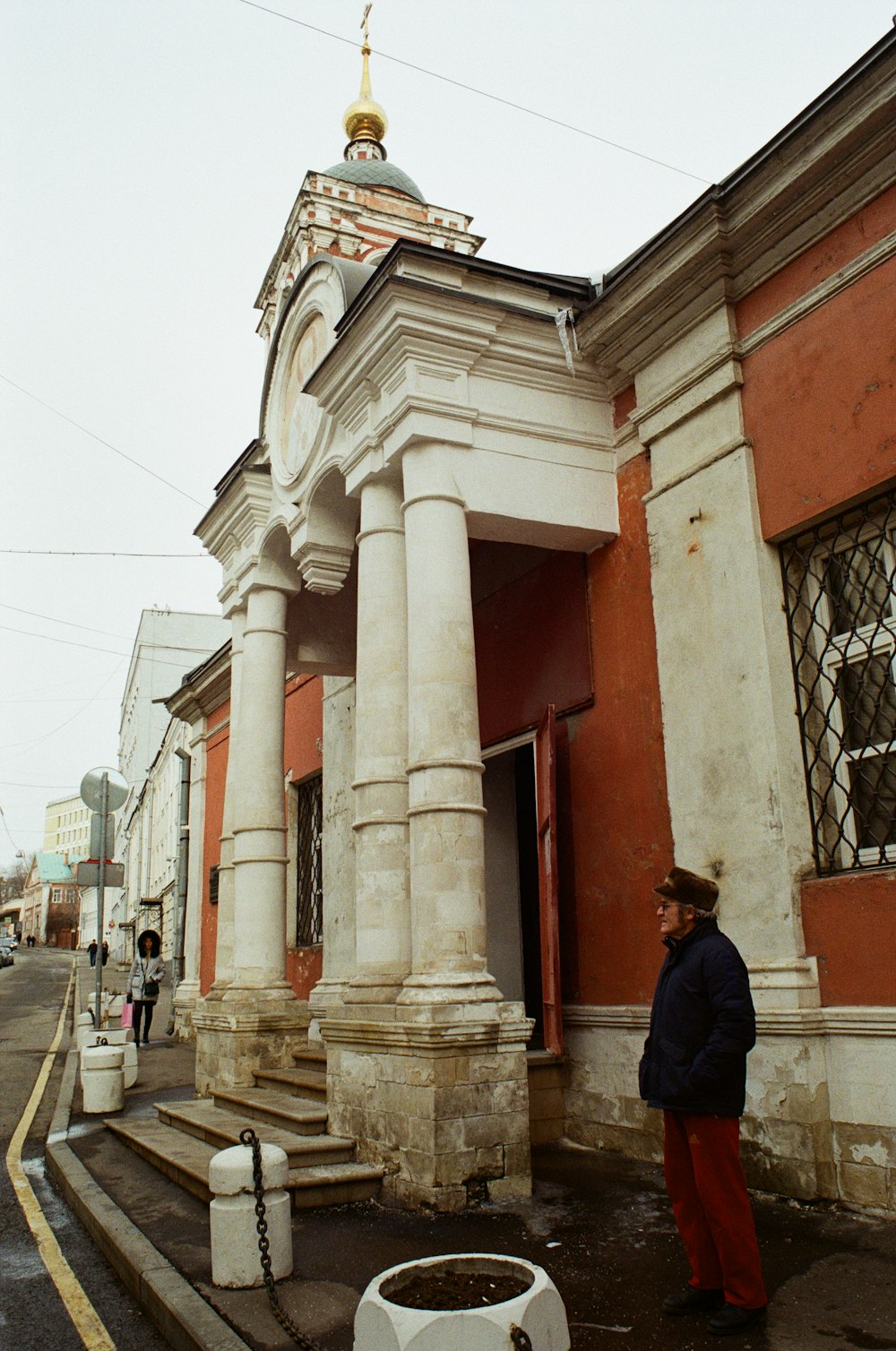 a person standing in front of a building