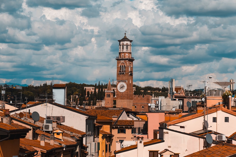 a tall clock tower towering over a city