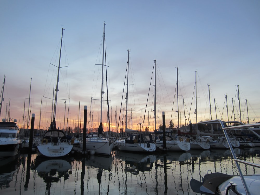 a bunch of boats that are sitting in the water