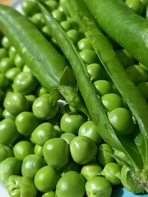 Close-up of fresh ingredients like peas and oats, highlighting the plant-based protein source.
