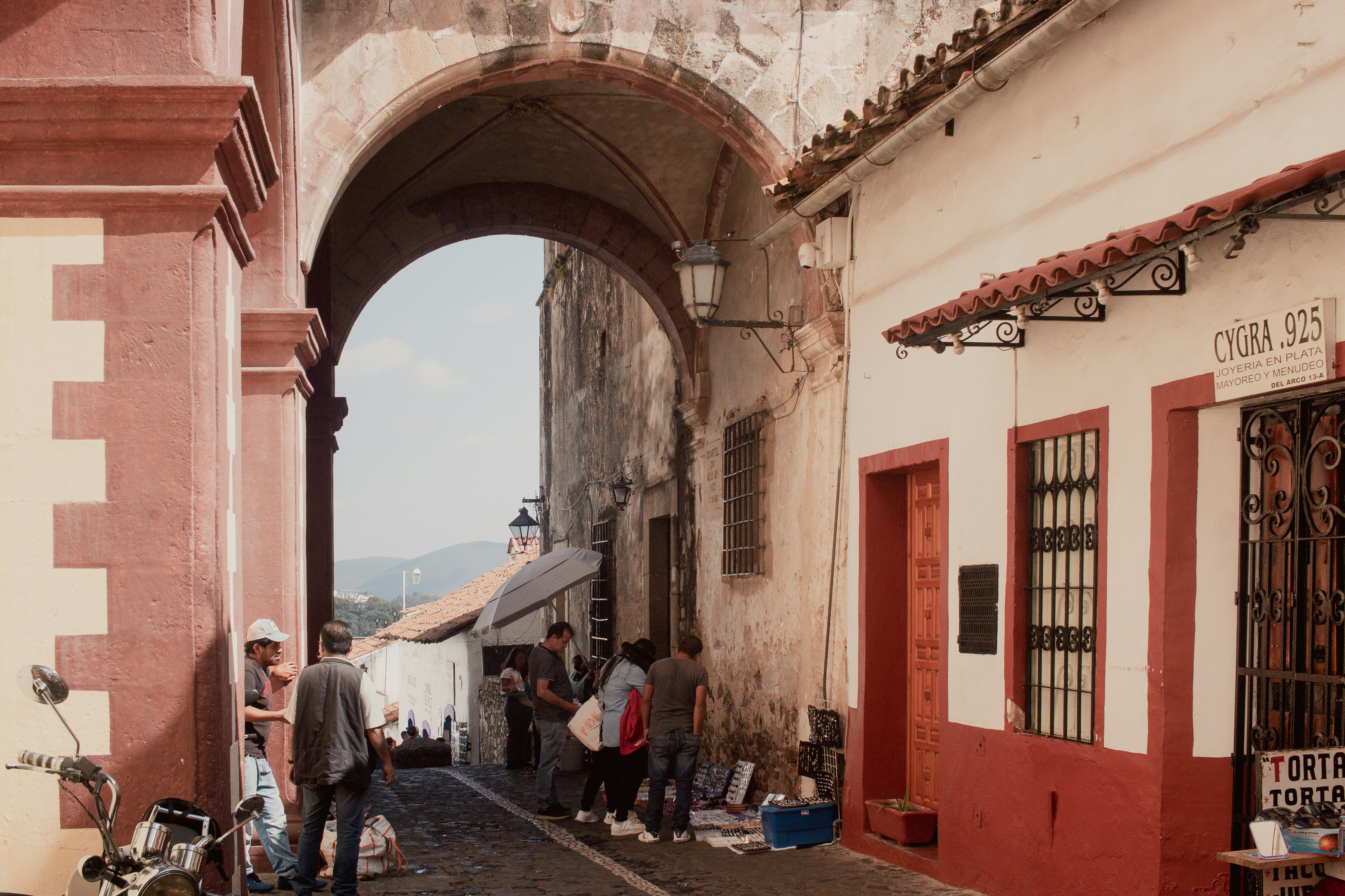 a group of people standing outside of a building