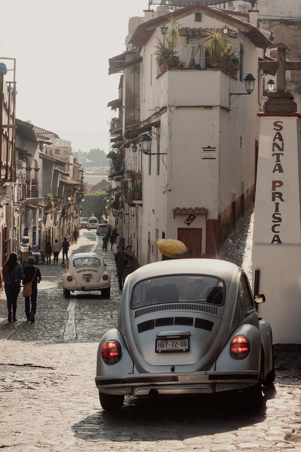 a car parked on the side of a street