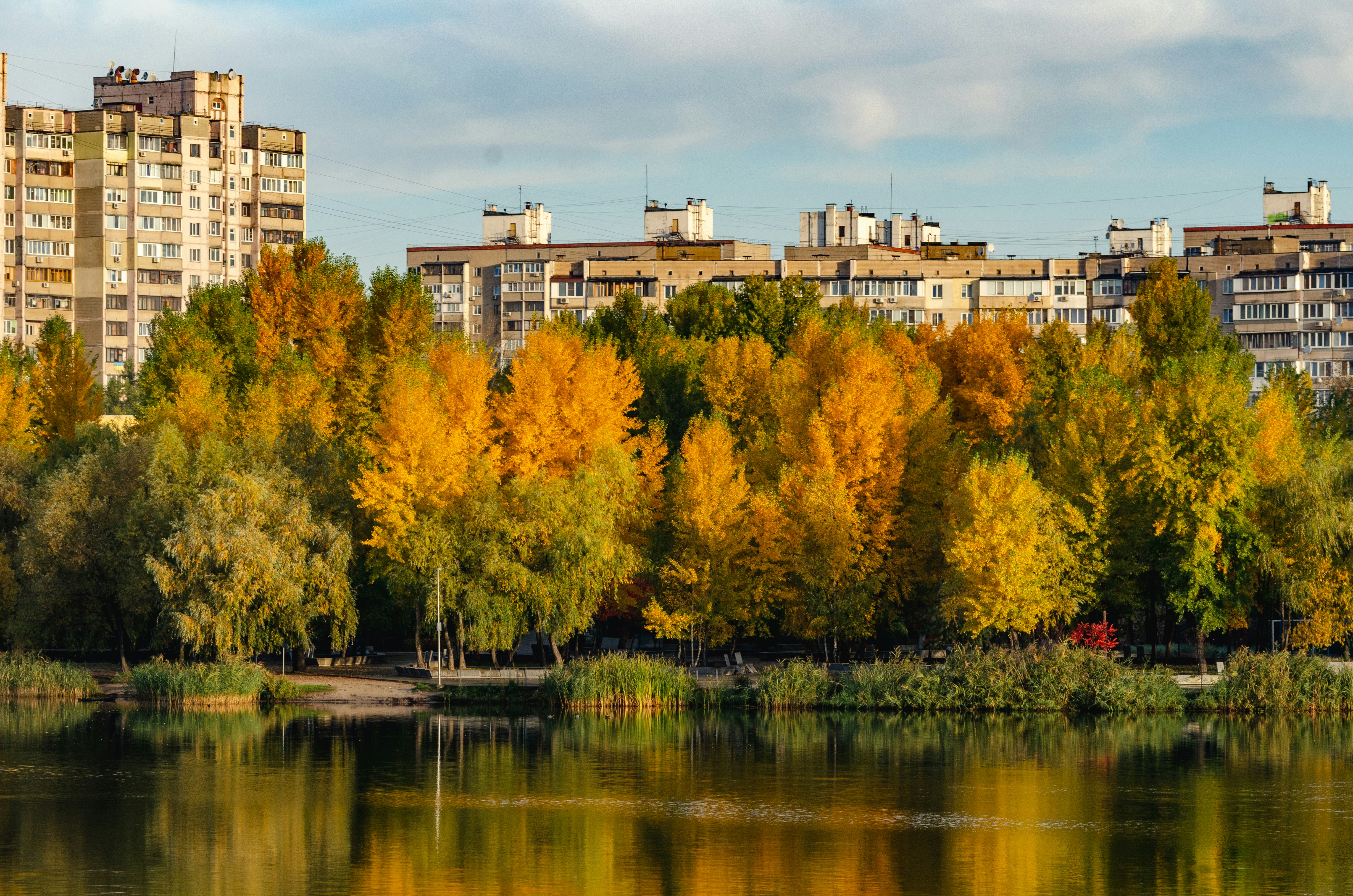 a body of water surrounded by tall buildings