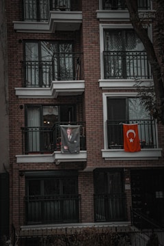 an apartment building with balconies and balconies on the balconies