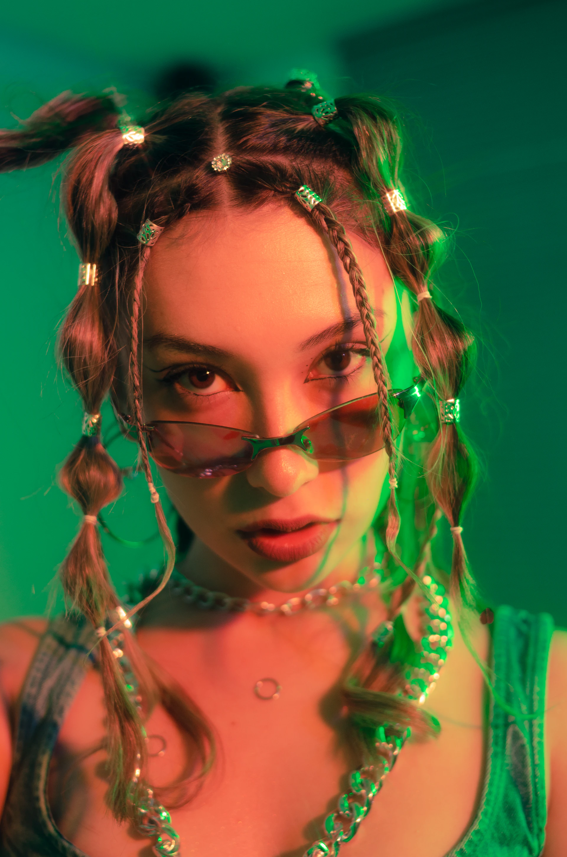 A vibrant display of box braids styled with colorful beads and accessories, perfect for a bold look.