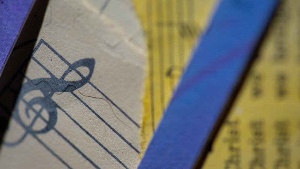 a close up of a sheet of paper with scissors on it