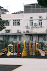 Children playing happily in the hotel’s colorful playground