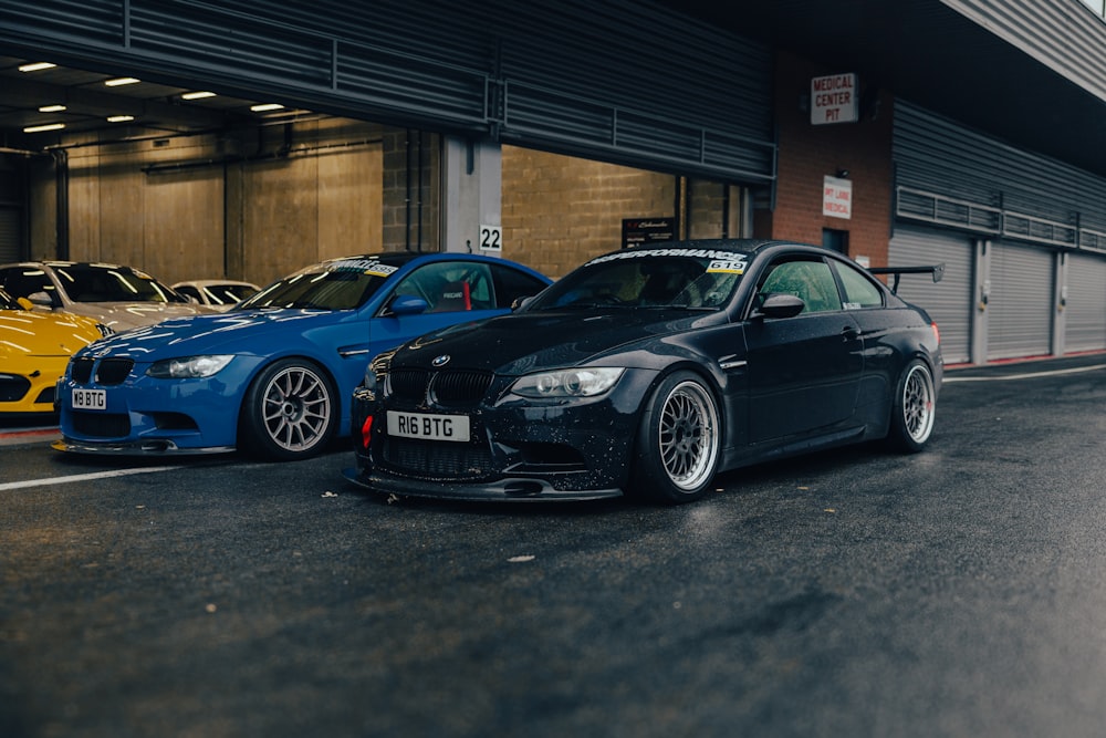 a couple of cars parked next to each other