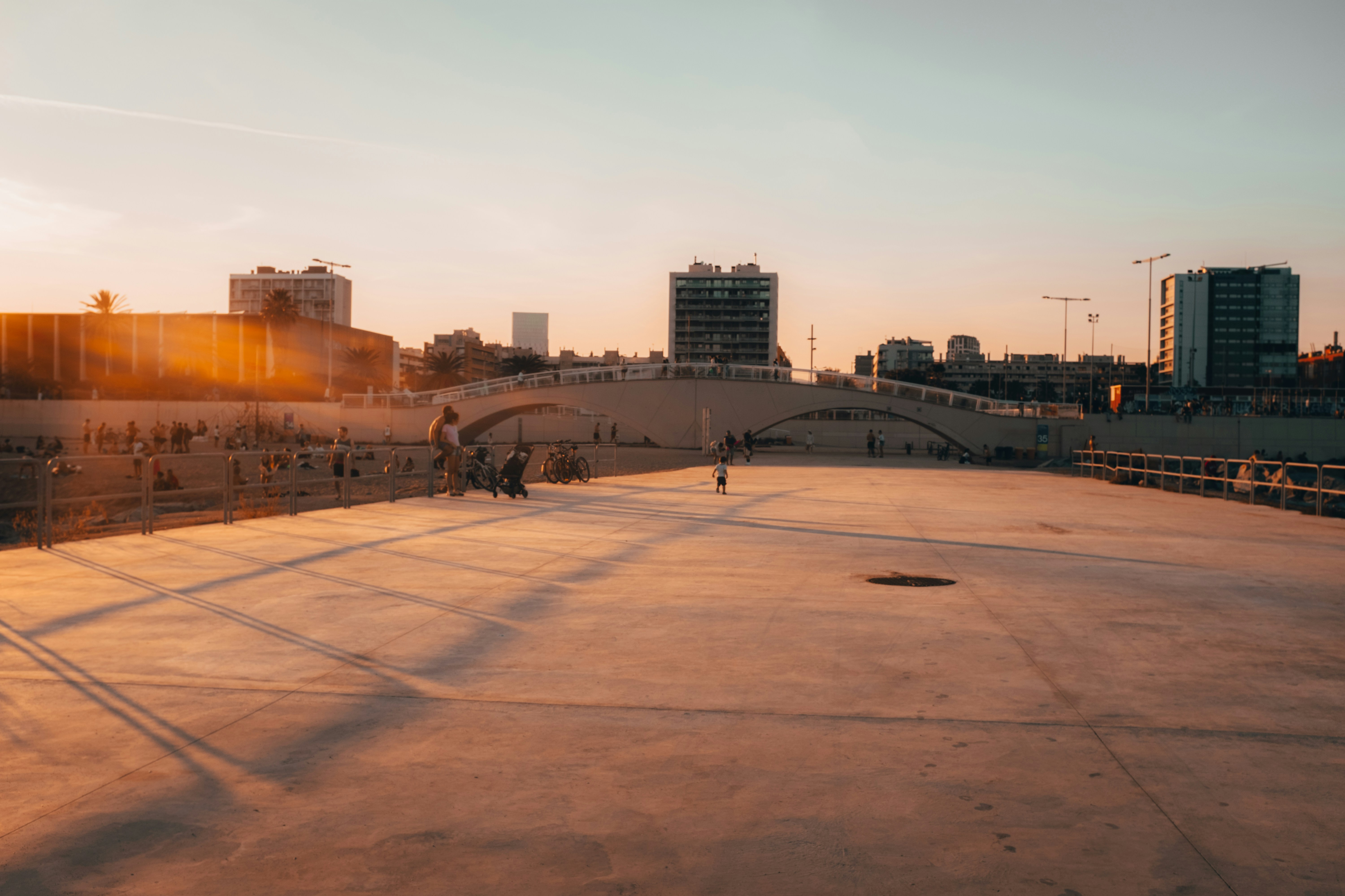 Sunset at a beach boulevard in Barcelona, Spain