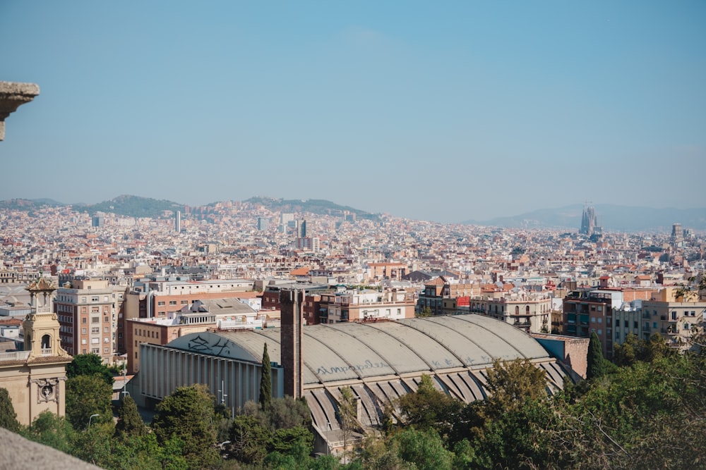 a view of a city from the top of a hill