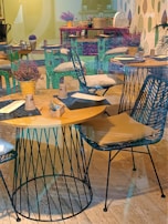 A vibrant cafe interior showcasing colorful seating and decor.