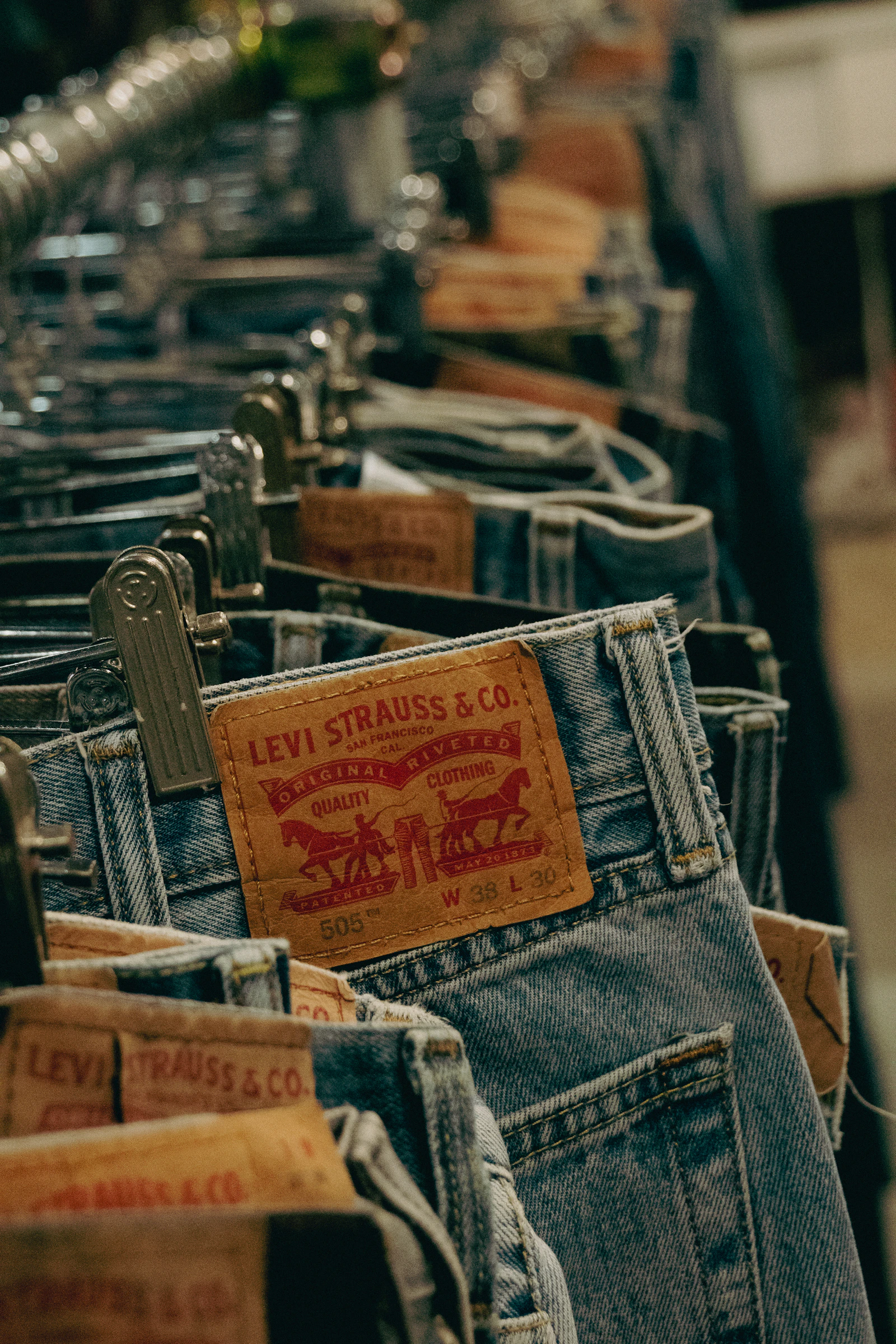 Levi's jeans on a rack, leather patch