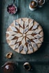 a plate of food on a wooden table