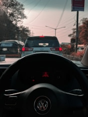 a view of a dashboard of a car from inside a vehicle