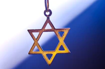 a star of david hanging from a chain