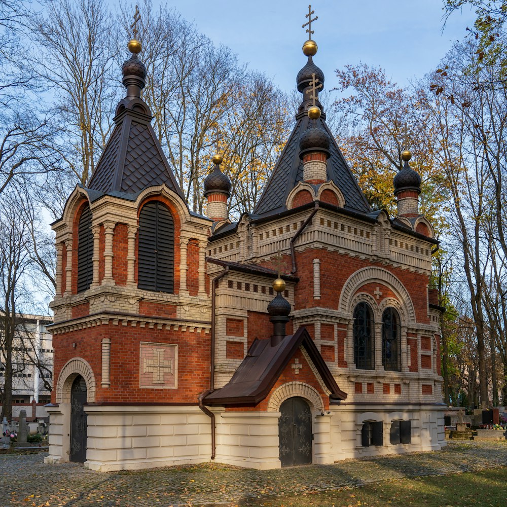 an old church with a steeple and a bell tower