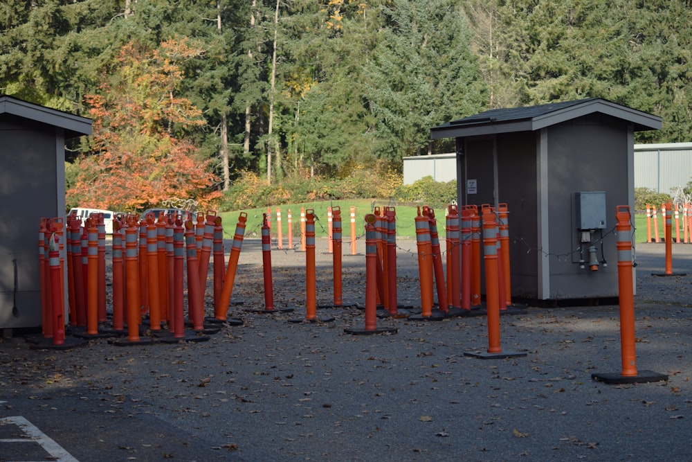 a parking lot with a lot of orange cones