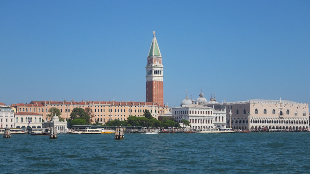 a large clock tower towering over a city