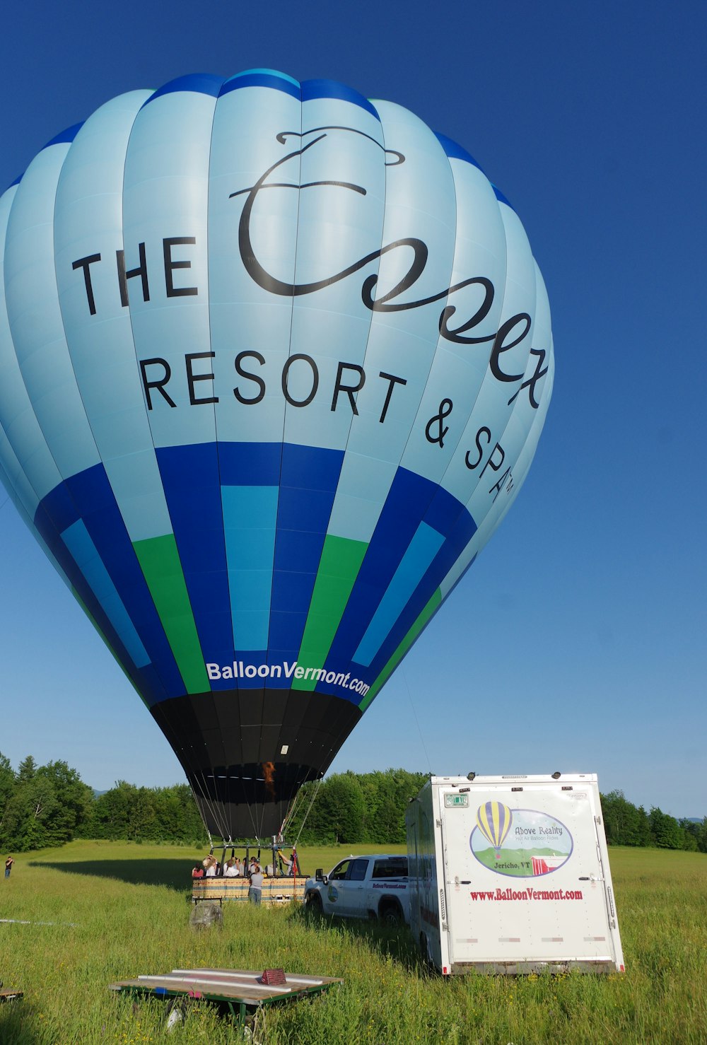 a large hot air balloon with the words the cove resort and spa on it