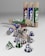 Several cylindrical cardboard tubes and coffee capsules in green, blue, and maroon are seen. The tubes are standing upright and lying on their side, with some capsules scattered around. The capsules are metallic and have bold lettering.