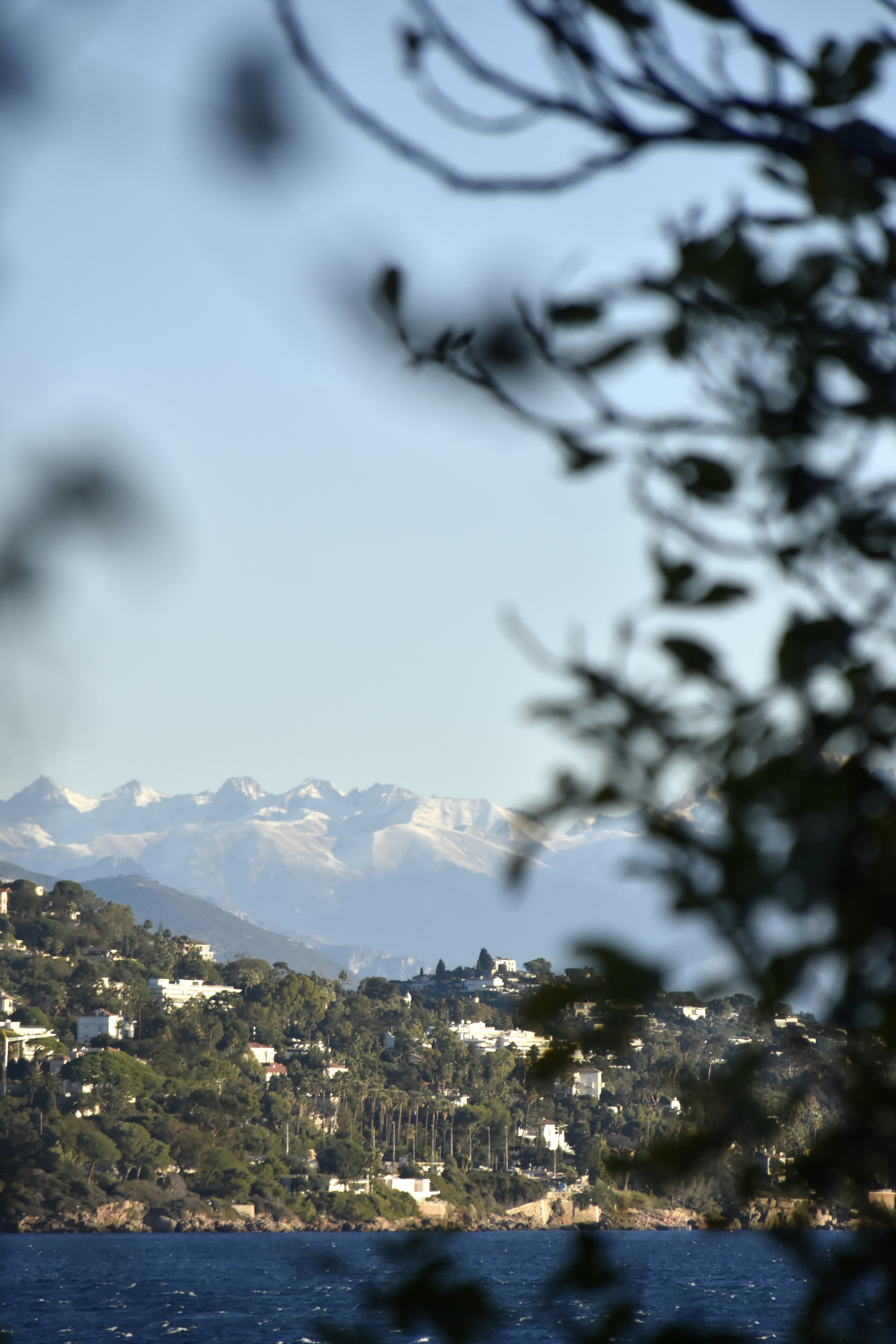 a view of a mountain range from across a body of water