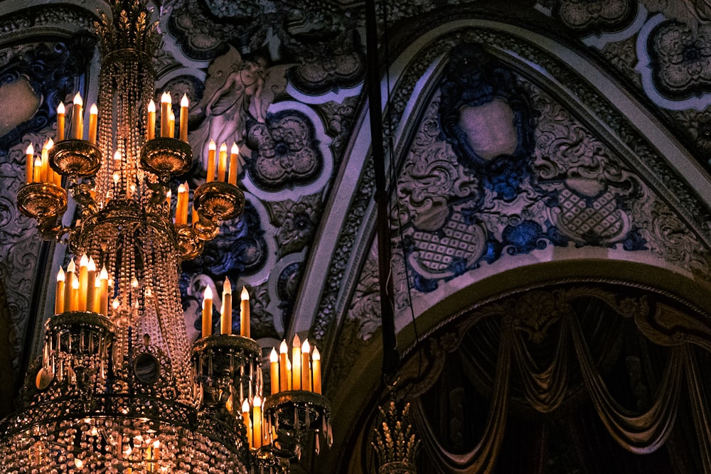 a chandelier hanging from the ceiling of a church