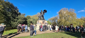 A group of earthly protectors standing strong in a community park.