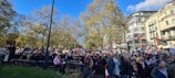 Crowd gathered at a lively BRP rally under a clear blue sky.