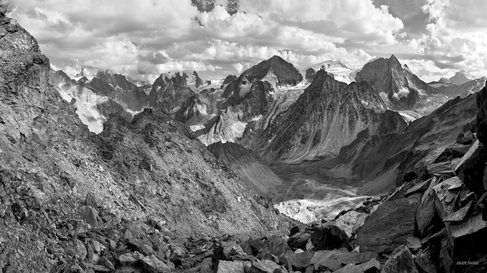 a black and white photo of a mountain range