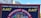 A banner displays the logo and name of the National Union of Rail, Maritime & Transport Workers, known as RMT. The banner's design includes bold yellow letters 'RMT' against a blue background with a central circular emblem showing a building and a blue-red contrast.