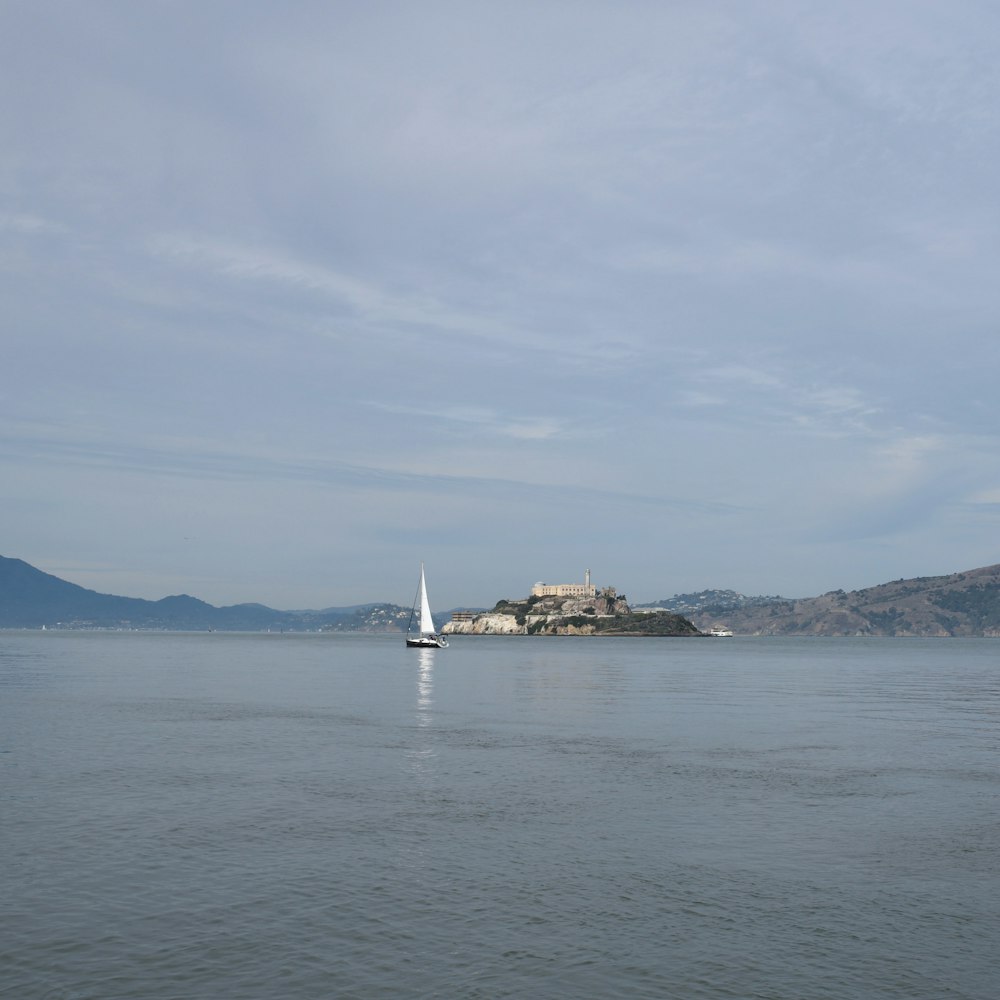 a sailboat in a large body of water