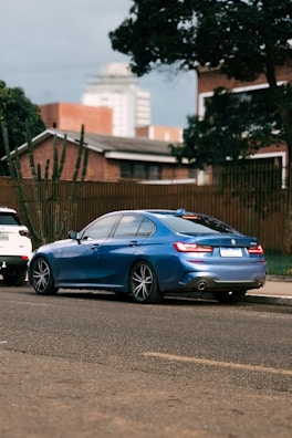 Front view of a sleek Guangxi Zhongxing Daoyuan sedan parked on a city street.