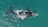 A large whale swims in clear teal water, its dark body almost entirely submerged except for the back and tail fin visible above the surface. White markings are noticeable near its head, and small ripples of water indicate movement.