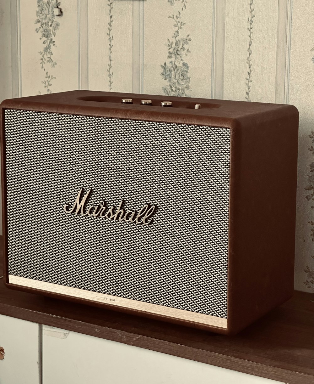 a brown radio sitting on top of a counter