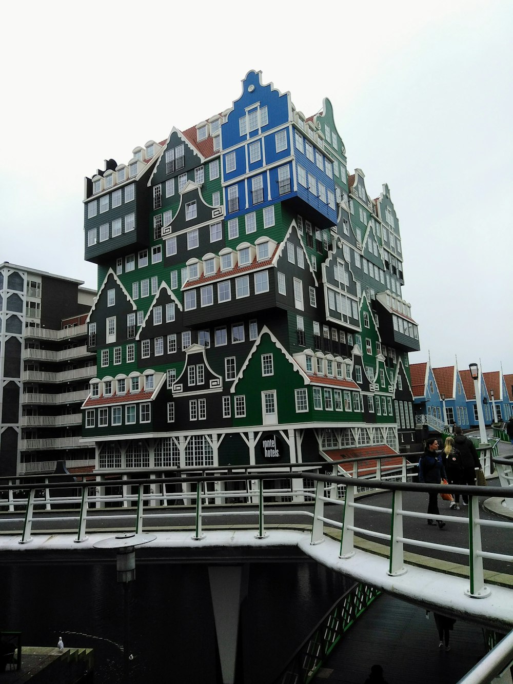 a large multi - story building with many windows and balconies