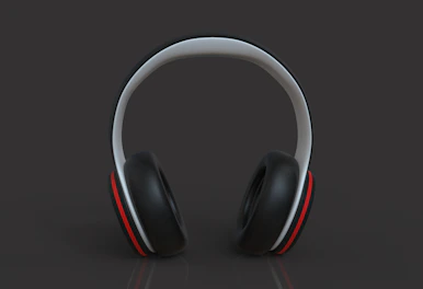 A stylish pair of headphones resting on a light gray background.