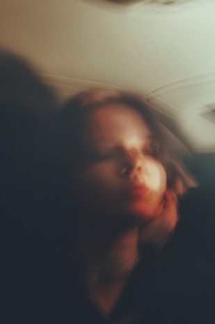 An AI-enhanced portrait with soft lighting and artistic color tones.