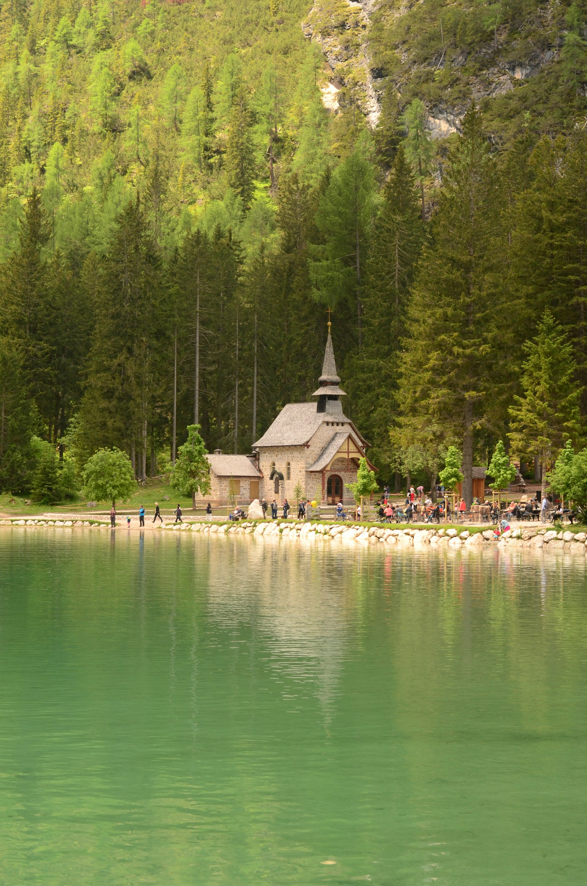 woman wearing yellow long-sleeved dress under white clouds and blue sky during daytime