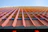 Close-up of fiber cement panels installed on a modern multifamily building exterior.