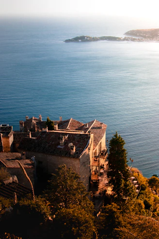 an aerial view of a building near the ocean