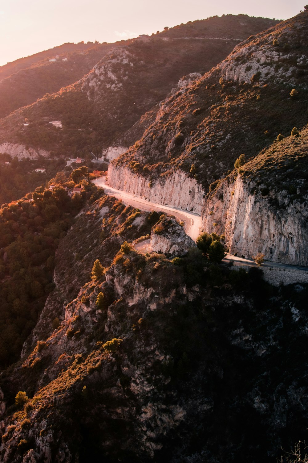 a winding road on the side of a mountain